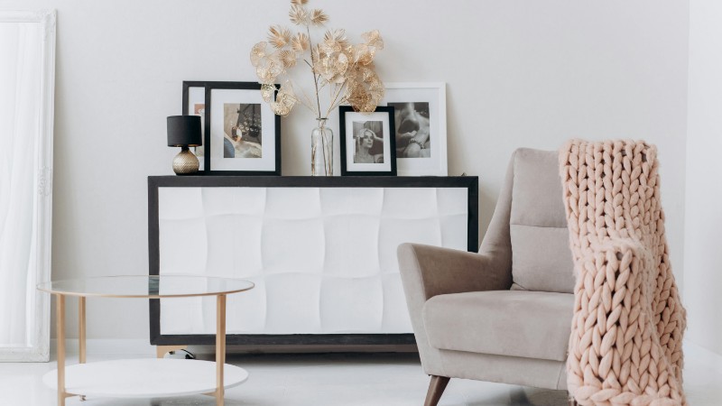A cozy, contemporary interior setup with a beige chair, soft decor, and elegant furnishings., tags: en vintage - pexel